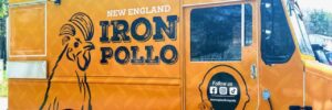 The orange food truck of New England Iron Pollo